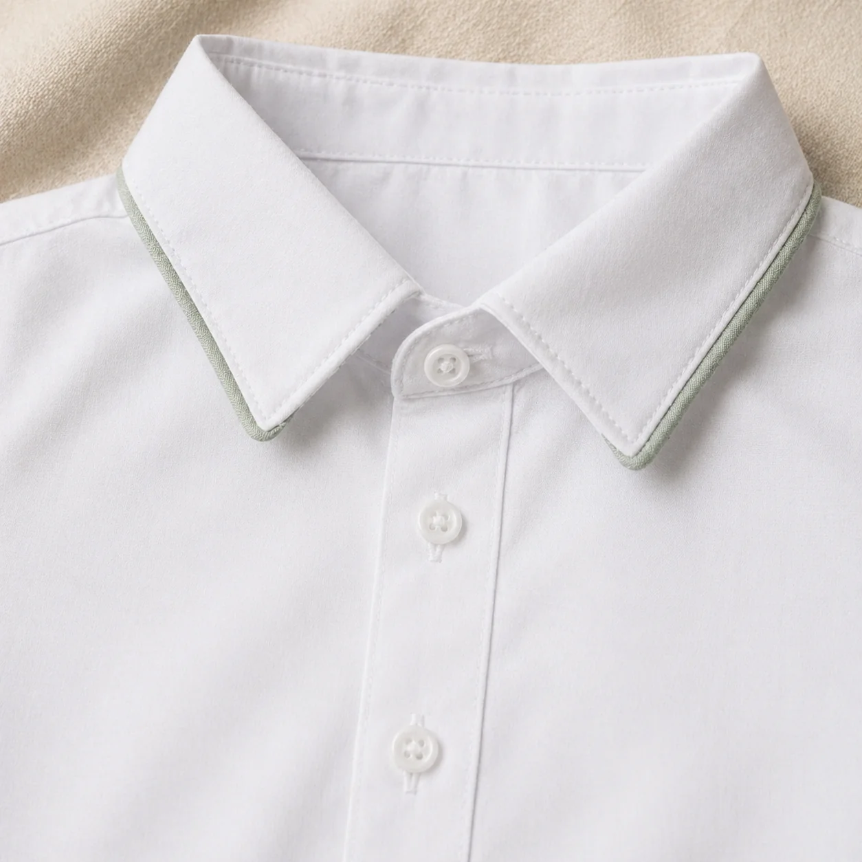 Camisa Social do Conjunto Versátil · tricoline branco · carcela na frente · colarinho com entretela dupla · botões artesanais · grade 2 a 8 anos